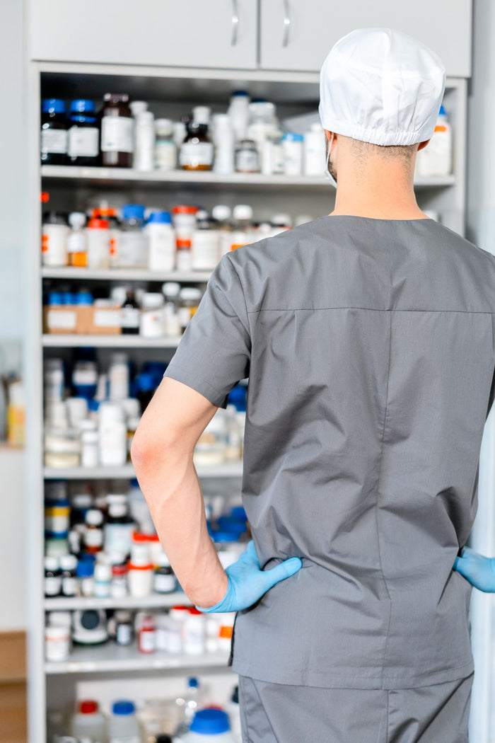 Pharmacy shelves stocked with health products