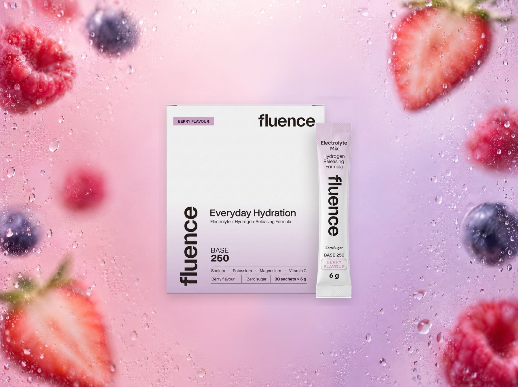A Base 250 Berry 30 Pack and a sachet among strawberries, raspberries and blueberries