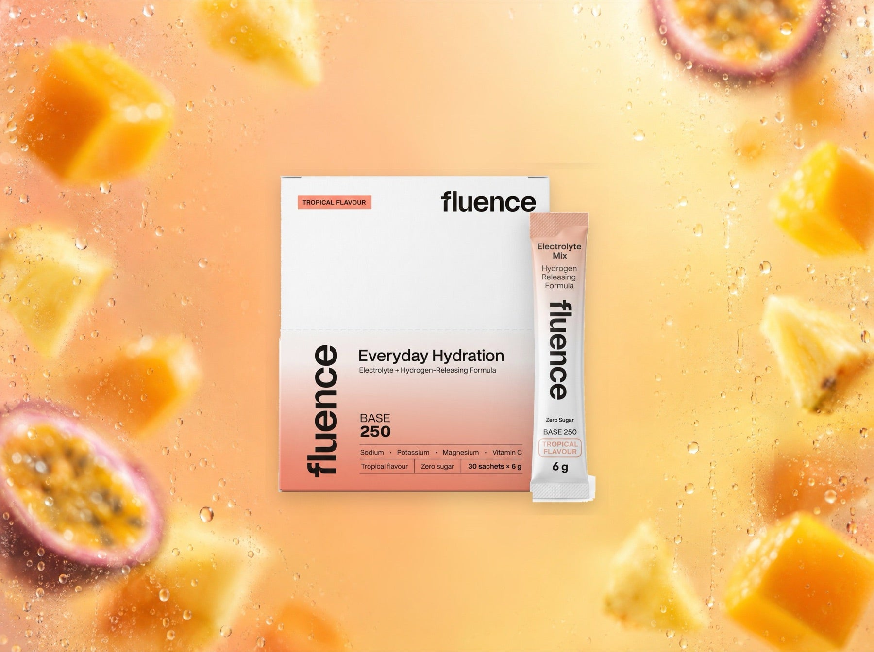 A Base 250 Tropical 30 Pack and a sachet among mango, pineapple and passionfruit