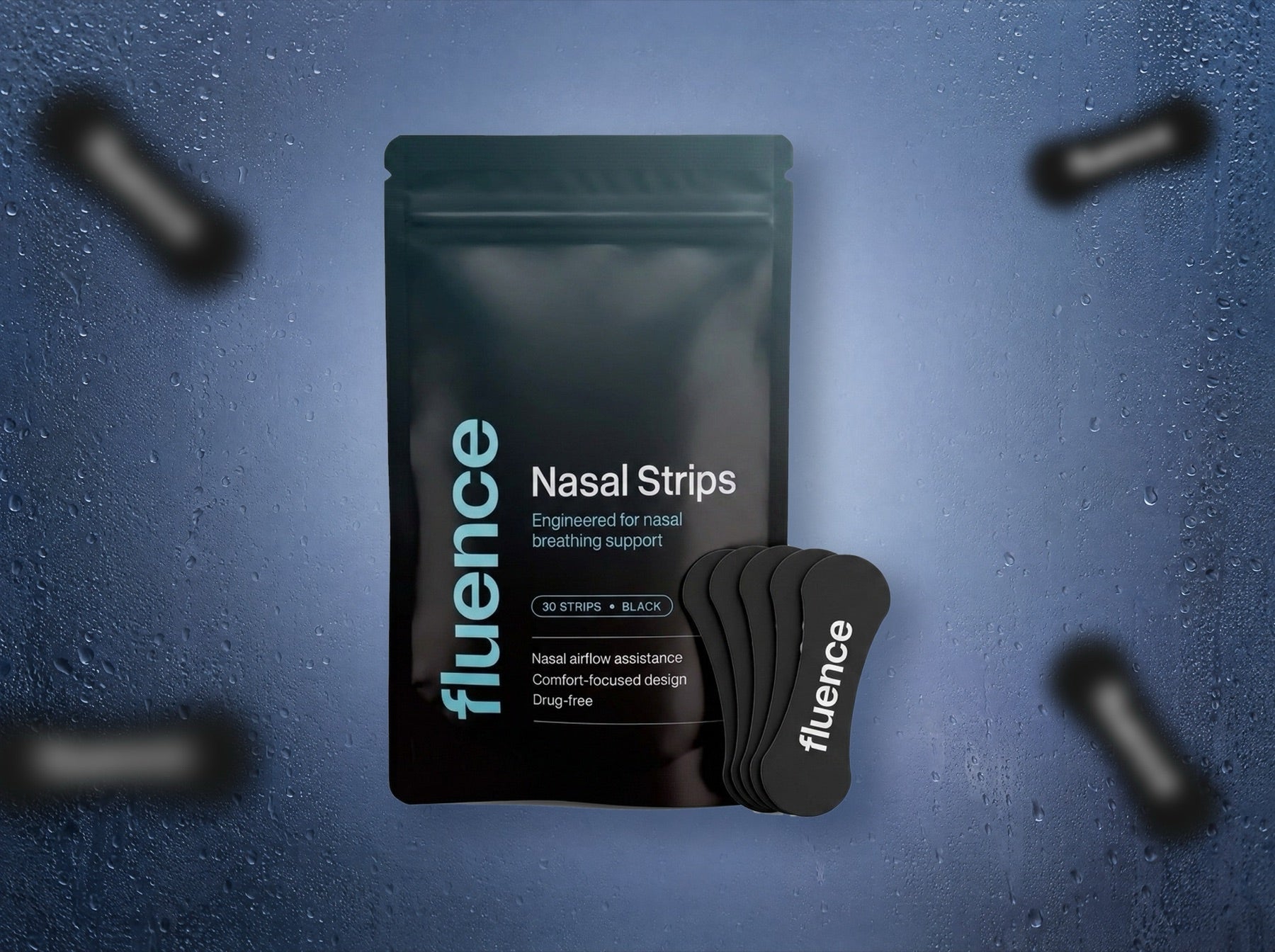 A pack of Fluence nasal strips with strips beside it, in evening blue light