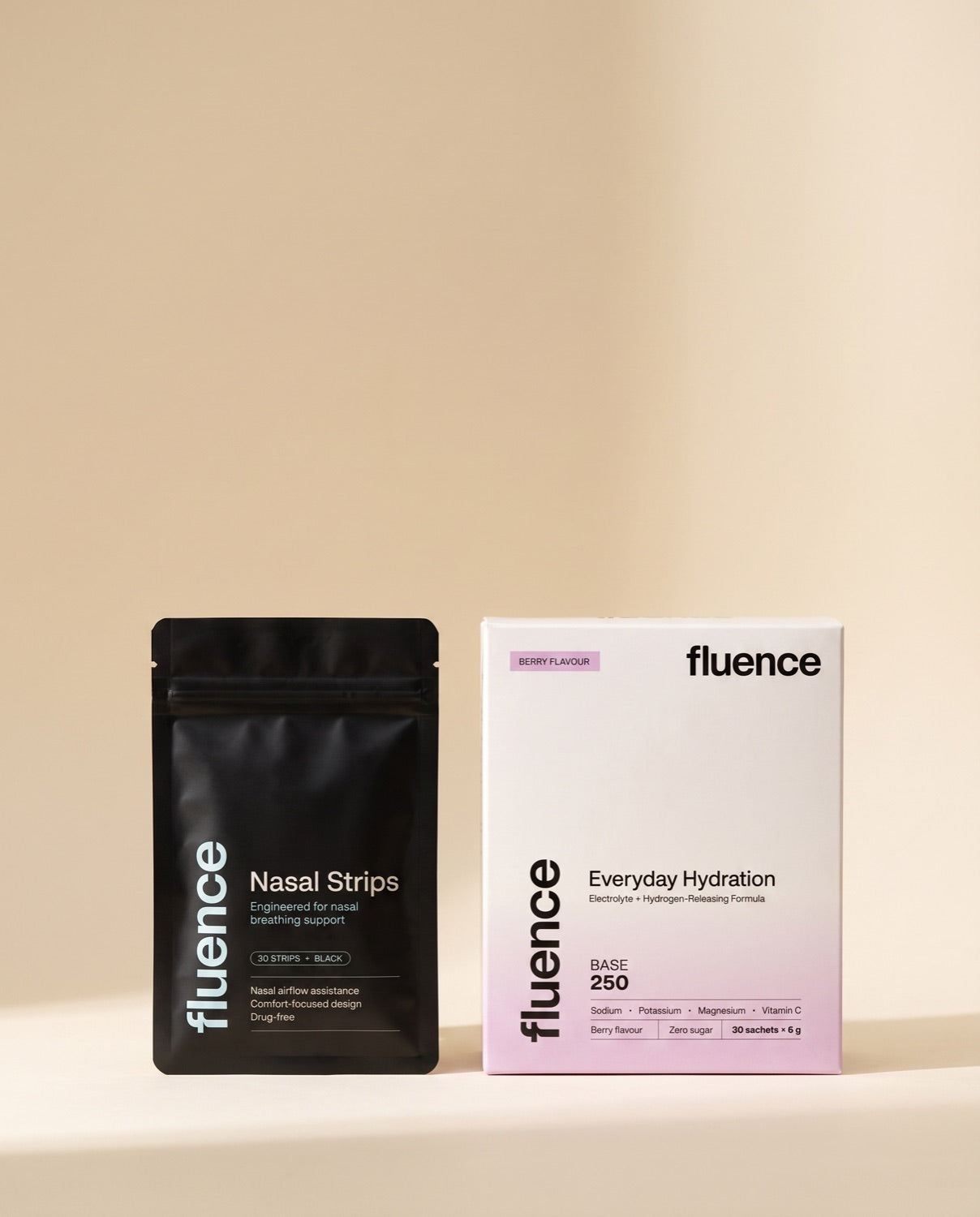 A pack of Fluence nasal strips beside a Base 250 box
